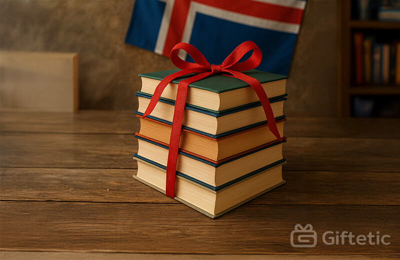 A stack of hardcover books tied with a red ribbon sits on a wooden table, symbolizing Iceland’s Book Flood tradition (Jólabókaflóð). In the background, the Icelandic flag hangs on a rustic wall, creating a warm and cozy setting reminiscent of holiday gift-giving.